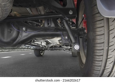 SUV car suspension and rear drive shaft. - Shutterstock ID 2166202617