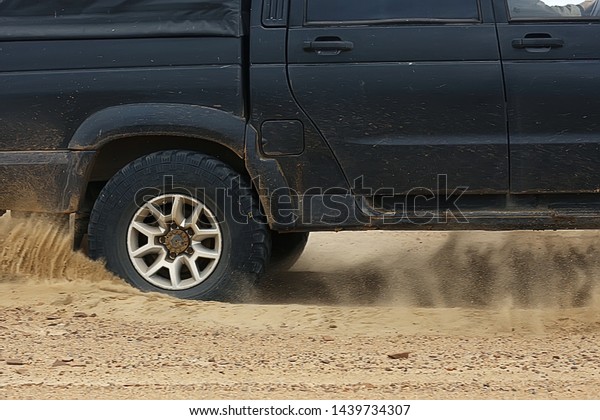 SUV in the desert / old\
vintage all-terrain vehicle, expedition in the desert on the sand,\
extreme cars