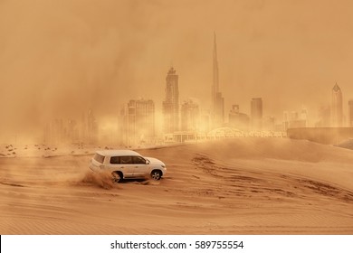 an SUV going off road in deserts of Dubai - Shutterstock ID 589755554