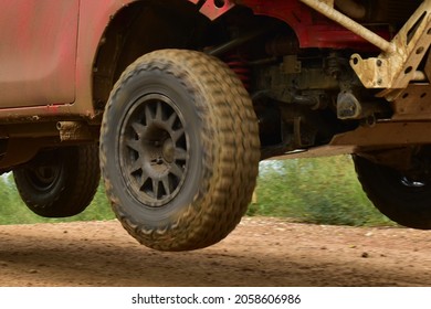 SUV Off Road  4WD Spin Mud Dirty Track On Mountain Hill.