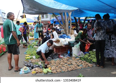 Suva, Fiji - June 5 2015: People Buying And Selling Vegetables During The Weekend Market In Suva, Fiji.