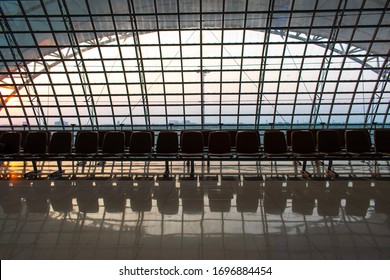 Suvarnabhumi Airport Bangkok -  January 31, 2020 : Empty Chairs Inside The Departure Terminal With An Airport Exterior Architecture Design At Suvarnabhumi Airport Bangkok.