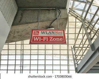 Suvarnabhumi International Airport,Thailand - March 19th,2019 : Abstract Soft-process Photo Of Free Wi-Fi Signboard Is Wireless Networking Technology Symbol For Service Passengers In Waiting Area Zone