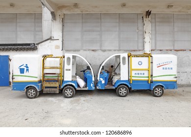 SUZHOU, CHINA - NOV 8: Electric Refuse Truck At A Refuse Depot On Nov 8, 2012 In Suzhou, China. China Govt Introduce Ambitious Policy To Introduce 5,000,000 Electric Vehicles To Its Roads By 2020.