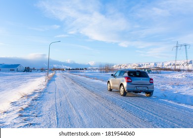 Suzuki Swift Car On A Winter Snowy Road. Iceland - 01.17.2018