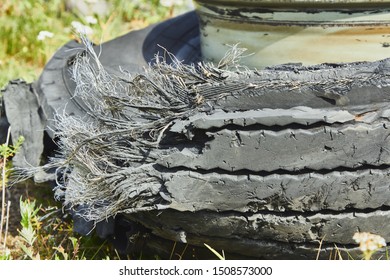 Svetciems, Latvia, August 29, 2019: tire of car after accident on a road because of frontal collision transportation background