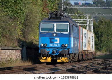 Svitavy, Czech Republic - 20.4.2019: Freight train with container wagons, CD Cargo. Loaded containers on wagons