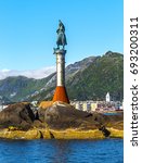Svolvaer harbour with Statue of the Fisherman’s wife in summer. Svolvaer is a fishing village and tourist town located on Austvagoya in the Lofoten Islands. Norway.