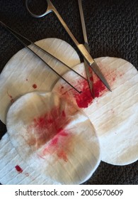 Swabs, Scissors, And Tweezers After Treating A Minor Injury