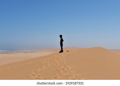 Swakopmund, Namibia – March 04, 2021: Sandboarding Near Swakopmund. 