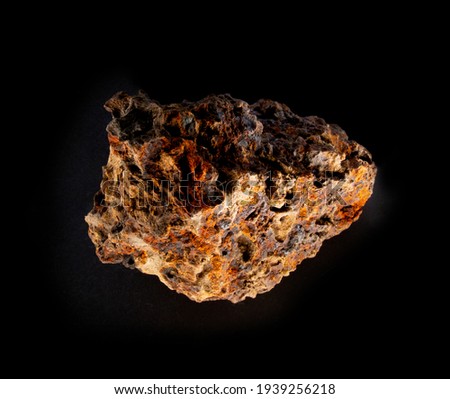 Swamp bog iron ore mineral from Belarus isolated on black. For geology mineralogy magazines websites article,   and posters etc.