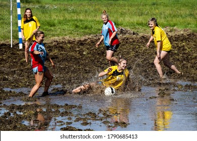 Swamp Football Championship In Belarus. Girls Playing Soccer In The Mud. Belarus/Oshmyany/1 August 2020