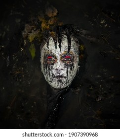 Swamp Monster. A Fabulous Creature In A Dark Swamp. Scary Creature At Night. 