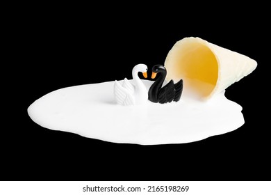 Swans Couple Swimming Close To Each Other In Melted Waffle Cone Ice Cream On Black Background.