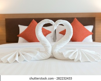 Swans Made From Towels On The Bed.