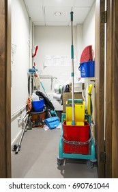 Swansea, UK: June 17, 2017: A Storage Room Full Of Cleaning Equipment Including A Vaccum Cleaner And Industrial Sized Bucket And Mop In An Office Building.