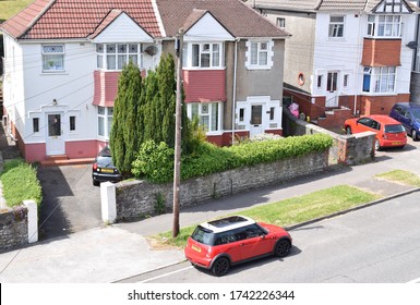 Swansea UK, May 23 2020: Street View With A Car Mini Parked By A Brick House On A Nice Day.