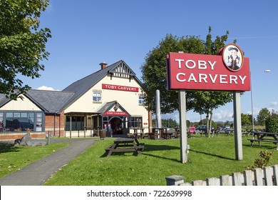 Swansea, UK: September 19, 2017: Front view of a Toby Carvery restaurant. Toby Carvery are a chain brand of over 150 restaurants established for over 30 years. Home of the Roast is their slogan.  
