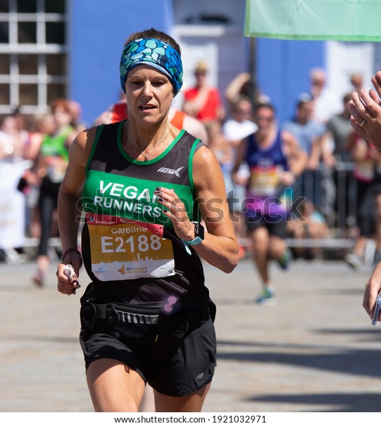 Swansea, Wales, UK - June 24th 2018: A\
vegan runner completes the Swansea Half Marathon\
2018