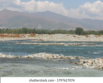 Swat River With Mountainous Background