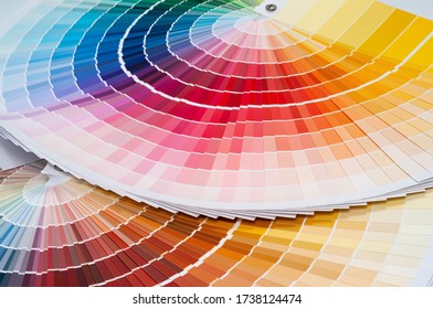The swatches of paints with a various palette. Color catalogs with different samples.