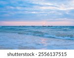 A swaying small boat in the sea on Weizhou Island Beihai City Guangxi Province China