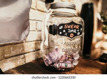 Swear Jar With Money Inside. PIggy Bank For Swear Words.