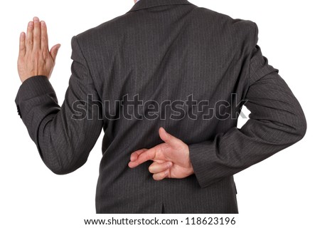 Swearing an oath with fingers crossed behind back concept for dishonesty or business fraud