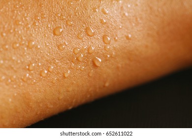 Sweat spot on arm represent body part and exercise.