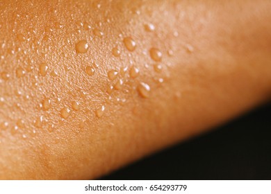 Sweat spot on arm represent body part and exercise.