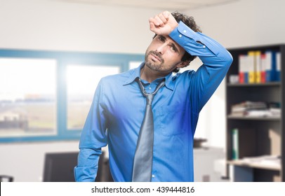  Sweating Businessman Due To Hot Climate