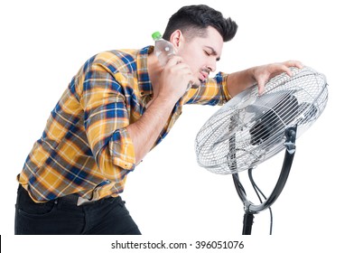 Sweaty And Thirsty Man Standing Near Fan And Cooling Off On Hot Summer Days Isolated On White Background