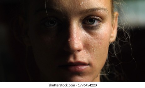 Sweaty Woman Looking at the Camera, Close-up
