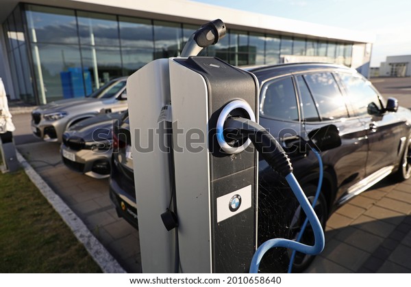LINKÖPING, SWEDEN- 18\
JULY 2021:\
BMW logo at a charging pole at a BMW car\
dealership.\
Photo Jeppe\
Gustafsson