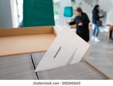 LINKÖPING, SWEDEN- 9 MAY 2014:
Election envelope and voter in a polling station.
Photo Jeppe Gustafsson