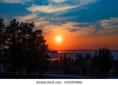 Östersund, Jämtland / Sweden - April Is 25 2019: Sunset Over Storsjön And Bydalsfjällen