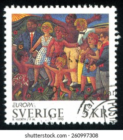 SWEDEN - CIRCA 1995: stamp printed by Sweden, shows Patrice Lumumba, Albert Schweitzer, children dancing, circa 1995