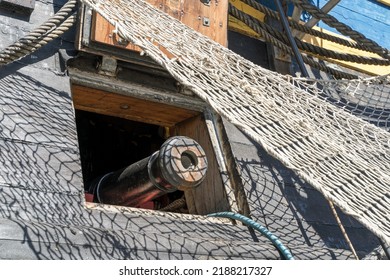 The Götheborg Of Sweden, A Sailing Ship Replica Of The Swedish East Indiaman Götheborg I. Moored Up In Docks Of Canary Wharf. Old Cannon Sticking Out Of A Port Hole. London - 9th August 2022