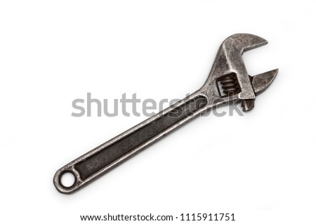 Swedish adjustable wrench. old wrench on isolated white background. plumbing repair.