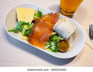 Swedish Appetizer - Salted Salmon Fillet, Cheese, Pitta Bread And Greens