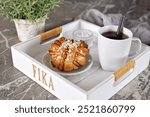 Swedish cinnamon bun with coffee. Swedish fika