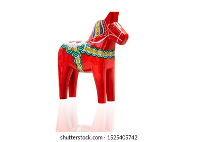 Swedish Dalahorse Figurine On A White Background.