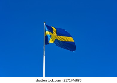 Swedish flag in blue with yellow cross