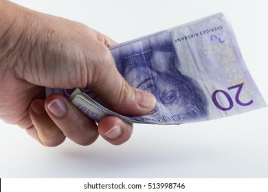 Swedish Money In Hand, Isolated White Background.