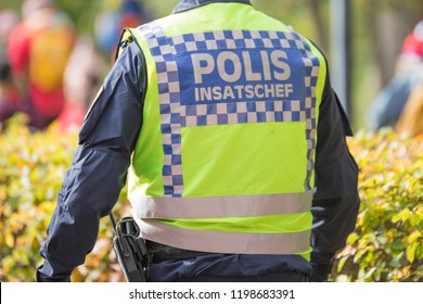 Swedish Police Task Force Commander With Reflective Vest. Translation On Vest Police Task Force Commander.