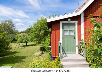 Swedish Wood House In Summer Garden