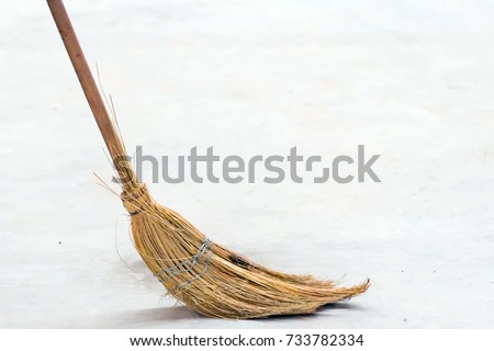 Sweep debris with a broom
