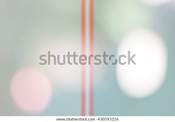 Sweet abstract bokeh wallpaper divided into two
sides by red straight
line.