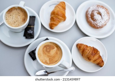 
Sweet Afternoon Snack: Coffee With Milk, Croissant And Ensaimada