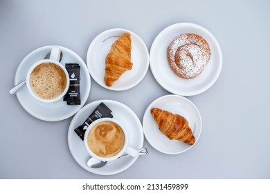 
Sweet Afternoon Snack: Coffee With Milk, Croissant And Ensaimada